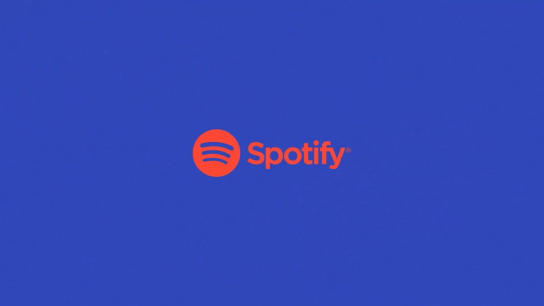 The Spotify logo, a green circle with three curved lines, on a blue background, representing a leading music streaming service.